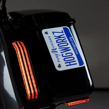 HOGWORKZ® Black Vertical Saddlebag License Plate Mount on bike
