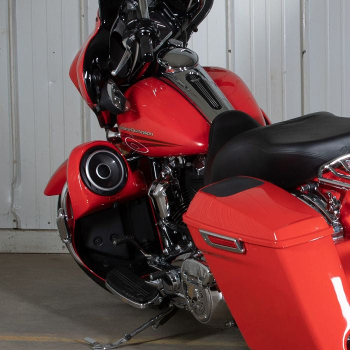 color matched harley rushmore speaker pods on laguna orange street glide