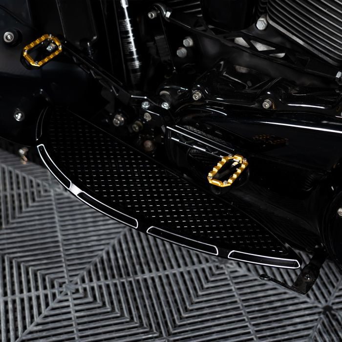 HOGWORKZ® Black Heaterz Driver Floorboards for Harley® Touring & Softail on black bike