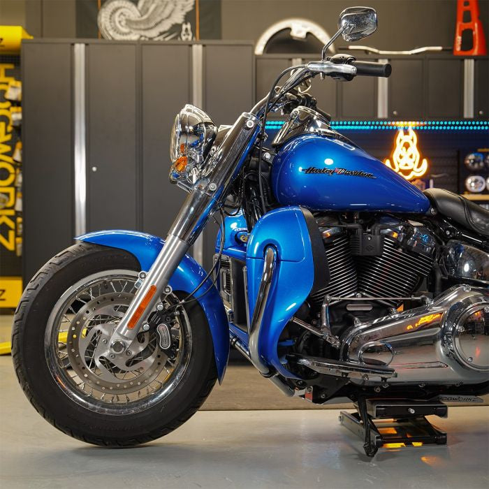 Chrome Lower Vented Fairing Engine Guard for Harley® Softail on blue bike