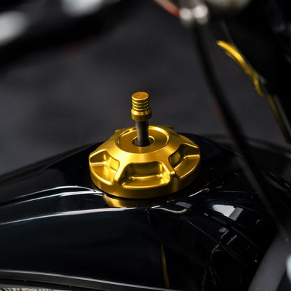 Gold HOGWORKZ® Performance MX Gas Cap for Harley-Davidson® Motorcycles on bike
