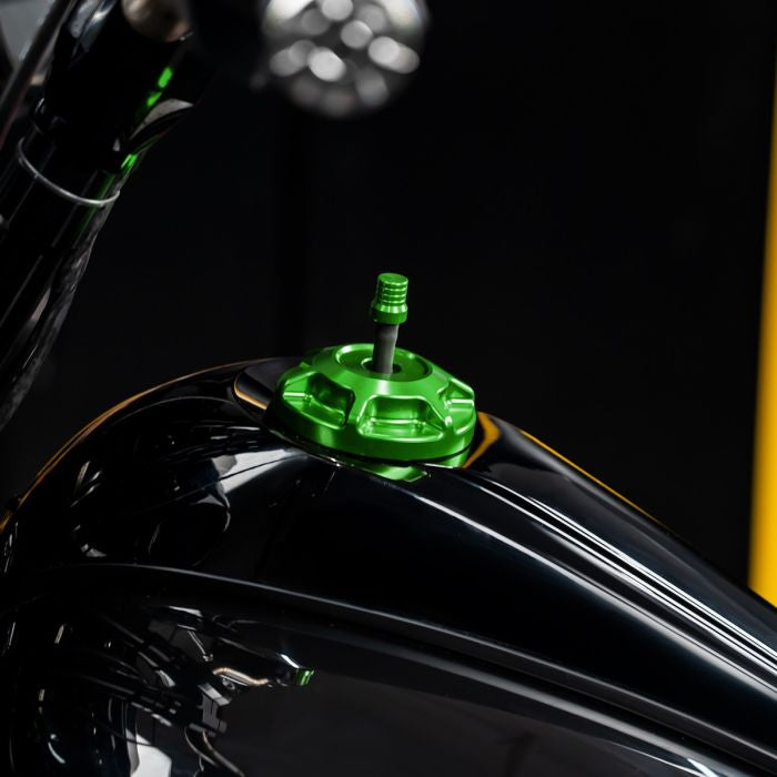 Green HOGWORKZ® Performance MX Gas Cap for Harley-Davidson® Motorcycles on bike