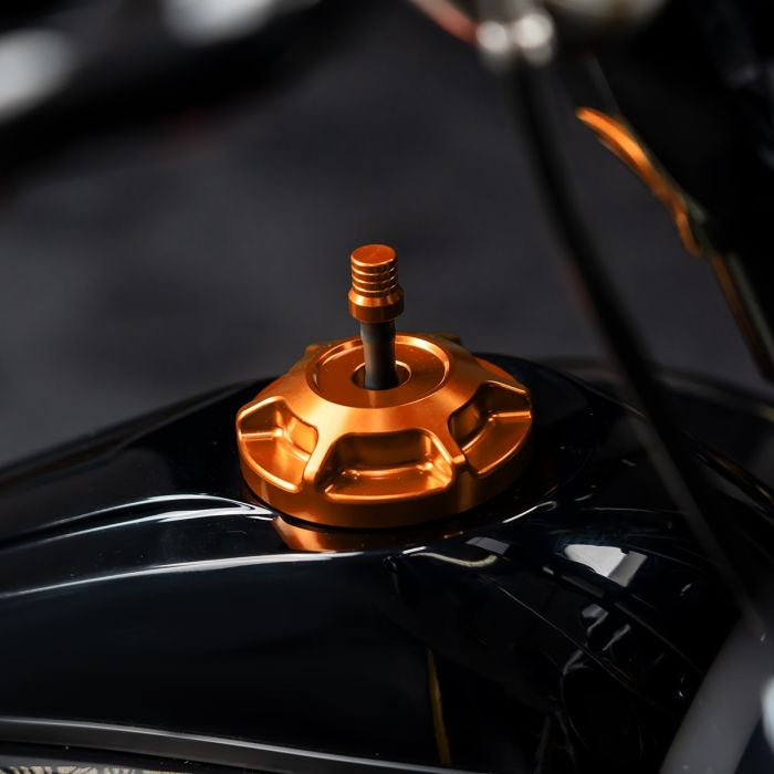 Orange HOGWORKZ® Performance MX Gas Cap for Harley-Davidson® Motorcycles on bike
