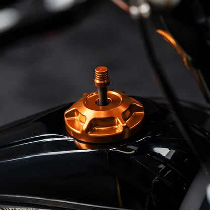 Orange HOGWORKZ® Performance MX Gas Cap for Harley-Davidson® Motorcycles on bike