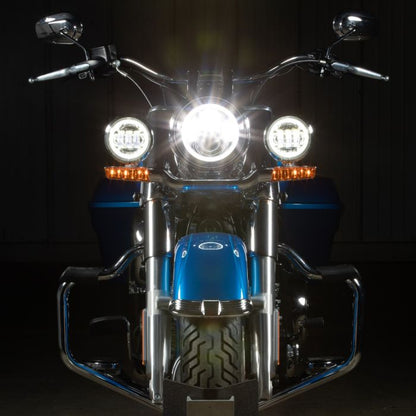 7" LED Black HALOMAKER® Headlight with Halo Auxiliary Passing Lamps on electric blue softail