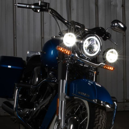 7" LED Black HALOMAKER® Headlight with Halo Auxiliary Passing Lamps on electric blue softail