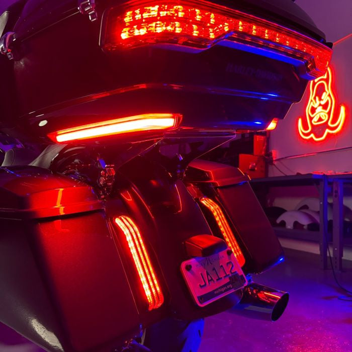 HOGWORKZ® Smoke Lumipro™ LED Side Markers for Harley® OEM King Tour Pack close up