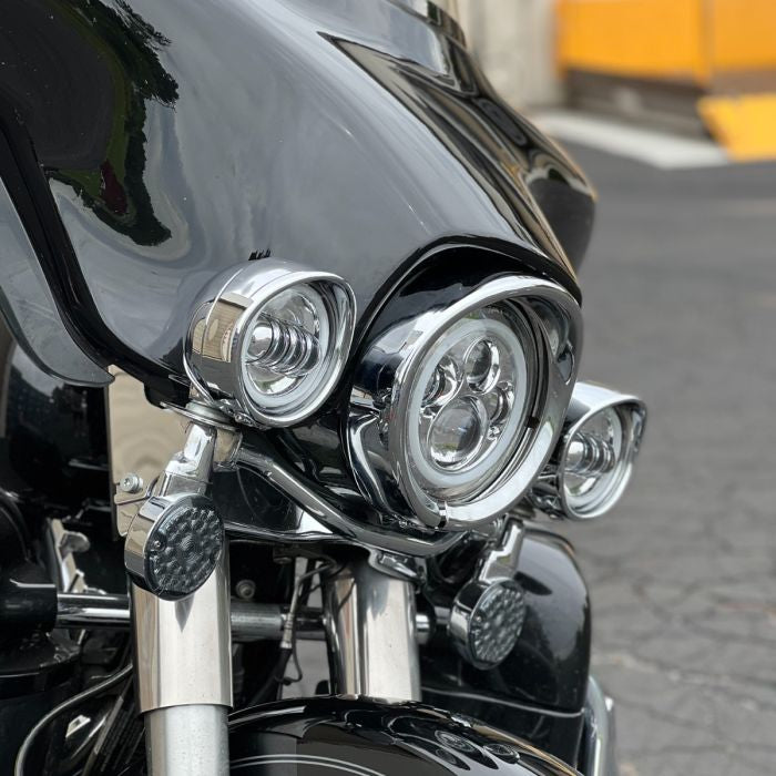 Chrome-plated visor style headlight trim ring. Direct bolt-on install for 7" headlight from HOGWORKZ on electra glide.